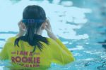 Young person in a Rookie Lifeguard t-shirt in the pool